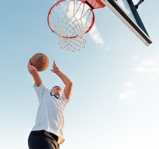 boy-using-basketball-hoop-energy